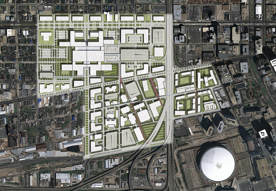 A site plan shows footprints of many large buildings within a green open campus situated in an otherwise dense and built-up urban area