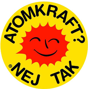 A famous anti-nuclear movement symbol reinterpreted for the Berliner Wassertisch symbol. Symbol consists of a yellow circle with a red sun adorned with a smiley face. Text is wrapped around the sun and reads: "Atomkraft? Nej tak"