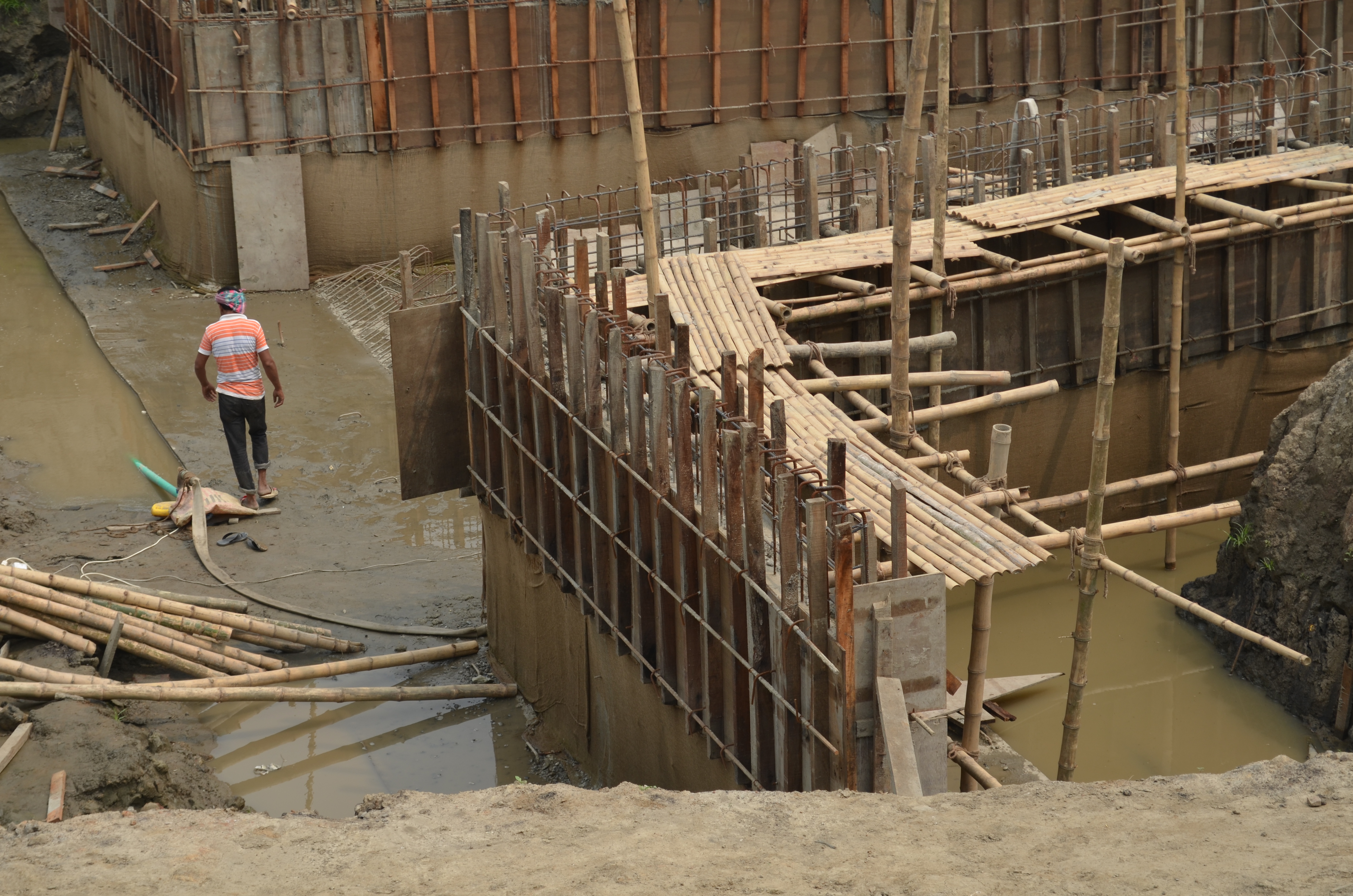 Workers on the site of a new drainage pump station in Dhaka, Bangladesh